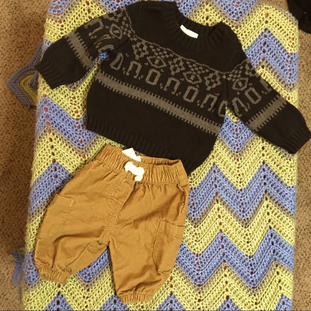Carter’s newborn sweater outfit.